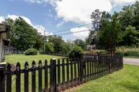 Love the black picket fencing