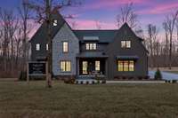 Sunset View of Front Exterior of Home