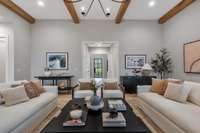 Foyer Looks Into Open Floor Plan Living Room