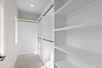 Bedroom 3 WIC with Plenty of Shelving and Hanging Space