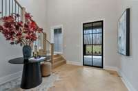 Oversized Foyer with Herringbone Engineered Wood Floor