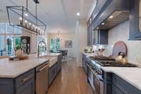 Commercial grade stainless steel appliances.