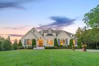 Enjoy stunning sunset views from your expansive front lawn, where peaceful evenings and beautiful skies are part of everyday life.