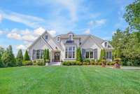 Classic Southern architecture and manicured grounds create timeless curb appeal, welcoming you with elegance and charm in the heart of Forest Hills.