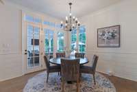 Casual dining area with direct access to the patio, ideal for seamless indoor-outdoor entertaining
