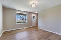 Front door enters into the formal living area. Stairs to the 2nd floor is located to the left of the front door.