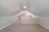 Spacious bonus room located on 2nd level divided by stairs into 2 large recreation areas. Separate HVAC unit.