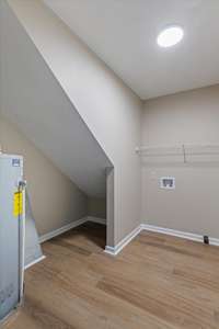 Large laundry room located on first floor off Den.