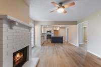 Den is open to the Kitchen and Breakfast area. Flooring is a soft carmel bringing warmth to each room.
