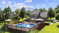 Large Backyard With Inground Pool And Large Deck