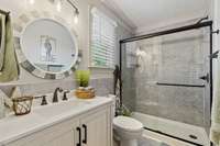 Remodeled Full Bath Located On Second Level With Tile Flooring And Tile Surround Tub/Shower