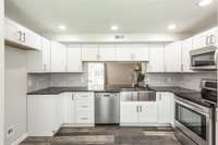 New cabinets, back splash, and granite