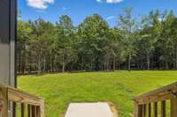 The backyard of the main home is totally private, perfect for a pool