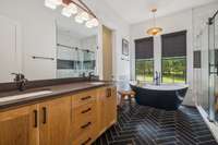 Double vanities and a soaking tub that will make you never want to leave home