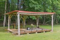 This outdoor stage faces a grassy amphitheater and backs up to the creek. What a perfect setting for concerts, weddings, or any kind of event! Let your imagination run wild.