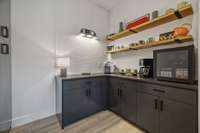 Butler's Pantry provides lots of extra storage and counter space for food preparation