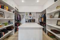 The primary closet is so much more than just a place to hang your clothing. This space doubles as a safe room, complete with escape hatch!