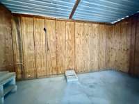 Outside storage closet under the 2 car carport