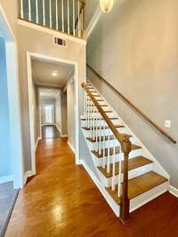 Beautiful hardwood flooring and hardwood stairs