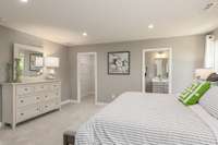 Large primary suite with two walk in closets.