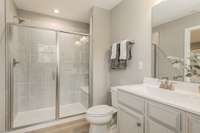 Primary bathroom shown with walk-in stand up shower (upgraded option)