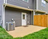 Back patio with partial privacy fencing