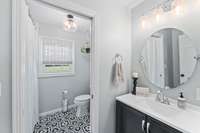 Original bathroom that was completely renovated. Perfect setup for multiple people to use to get ready.