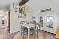 The charming breakfast nook leads into the Florida room.