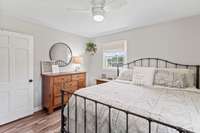 Master bedroom is a peaceful space with plenty of natural light.