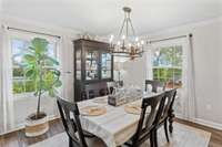 Dining room off of the kitchen and living room is plenty big for a regular size dining room table and has beautiful natural light.