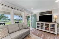 Walk into the open concept space through the living room door. The space is absolutely beautiful.