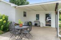 Covered back patio is the perfect entertaining space.