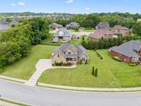 A large parking pad provides lots of additional space for vehicles or recreational activity!  2028 Martins Bend Dr.  La Vergne, TN 37086