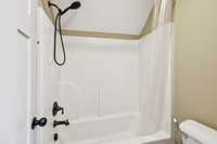 It includes a combo shower and tub, with separate doors for the shower and toilet for enhanced privacy. 2028 Martins Bend Dr.  La Vergne, TN 37086
