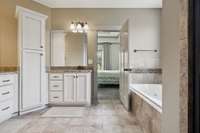 The ensuite bathroom offers tile flooring, generous cabinet storage, and split vanities for added convenience.  2028 Martins Bend Dr.  La Vergne, TN 37086