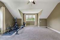 Carpet flooring and a ceiling fan make the space both comfortable and versatile for a variety of uses. 2028 Martins Bend Dr.  La Vergne, TN 37086