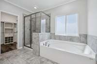 Tile walk in shower and large garden tub