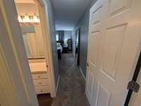 the private entrance to the primary bedroom and primary bath has a door that can be closed for a private oasis.