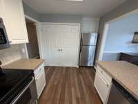 The combo laundry/pantry is just off the kitchen