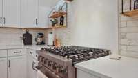 The LP commercial gas range comes with a center griddle.
