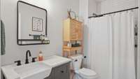 A three-piece bath is located in the guest/in-law apartment.