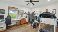 A separate heated and air conditioned room (mini-split HVAC system) is set up as an office/gym/man cave .