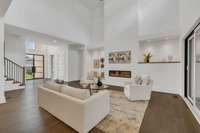 The Great Room with feature walls for art with gallery lighting. The fireplace with multiple flame color options. This room brings a feeling of peace and calm