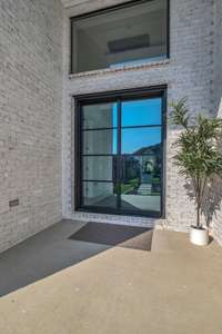 Statement glass and iron doors