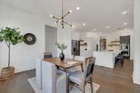 The Dining Room conveniently open to the Kitchen
