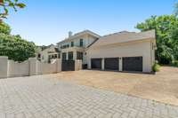 3-car garage with recently upgraded garage doors and back entry to pool area