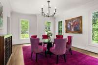 Bright and airy formal dining room with oversized windows