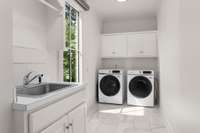 Spacious laundry room off of the 3-car garage