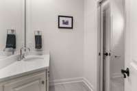 Second vanity connected to full-bath