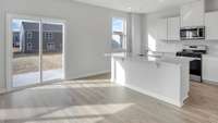 THIS KITCHEN BLENDS STYLE AND FUNCTIONALITY BEAUTIFULLY - SLIDING GLASS DOORS TO YOUR BACK PATIO AND OUTDOOR OASIS